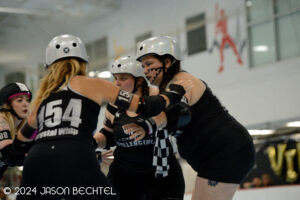 A group of CRG blockers prepare to defend. Photo by Jason Bechtel.